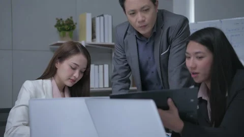 Business concept of 4k Resolution. The manager is summarizing the work to the Stock Footage 150329065