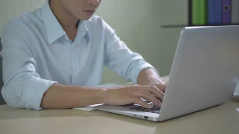 Business concept of 4k Resolution. Young Asian men searching for information  Stock Footage 155344568