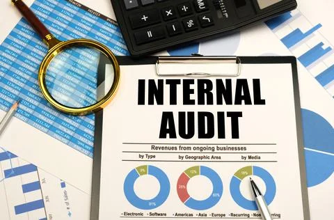 Business concept. Against the background of charts and graphs, there are offi Stock Photos
