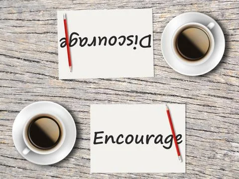 Business Concept : Comparison between discourage and encourage Foto stock
