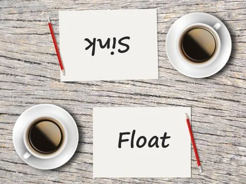 Business Concept : Comparison between float and sink Foto stock