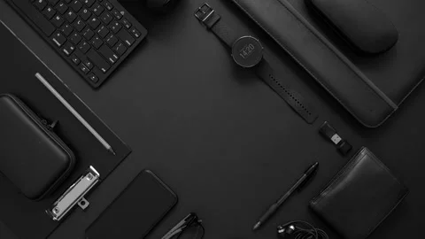 Business concept. Flat lay composition with various black gadgets on dark black Stock Footage 133070115