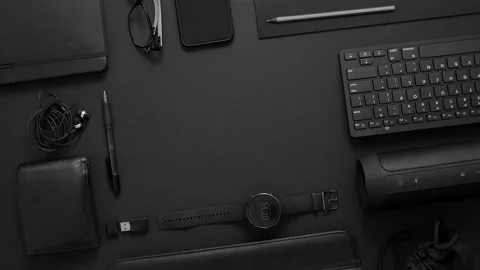 Business concept. Flat lay composition with various black gadgets on dark black Stock Footage 154730140