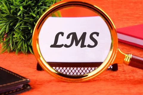 Business concept. Learning Management System LMS word through a magnifying .. 스톡 사진