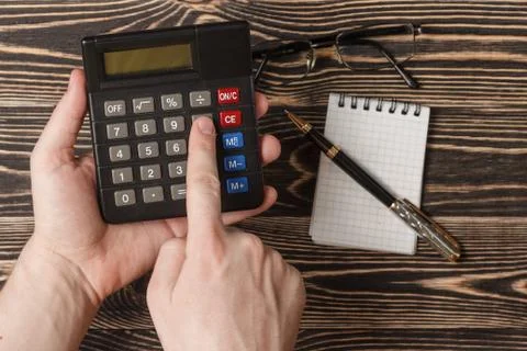 Business concept with pen, notebook and calculator Stock Photos