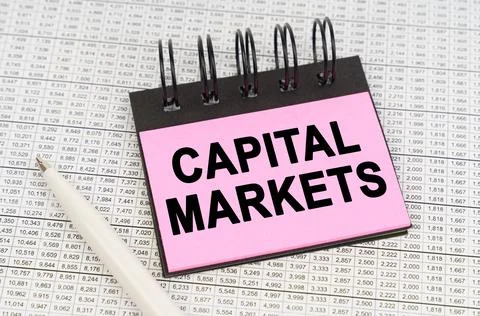 Business concept. On reporting documents and charts there is a pen and a note Stock Photos