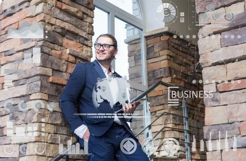 Business concept. Young man using tablet Stock Photos