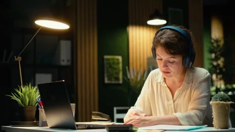 Business consultant summarizing important ideas in a meeting call with investors Stock Footage 317661768
