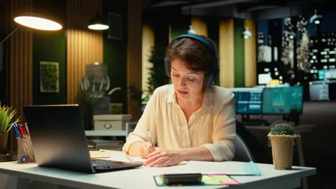 Business consultant summarizing important ideas in a meeting call with investors Stock Footage 317965197
