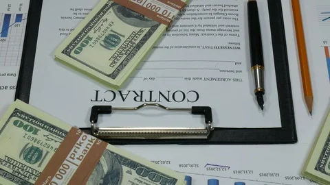 Business contract and dollars Stock-Footage 87804495