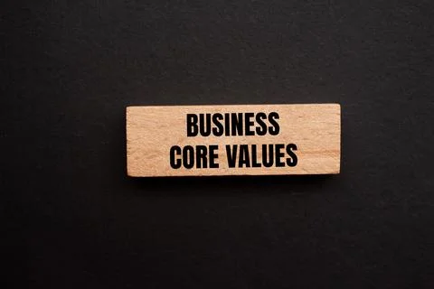 Business core values message written on single wooden block with black backgr Foto stock