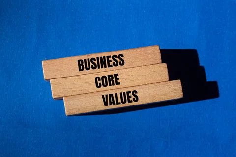 Business core values message written on wooden blocks with blue background. C Stock-Fotos