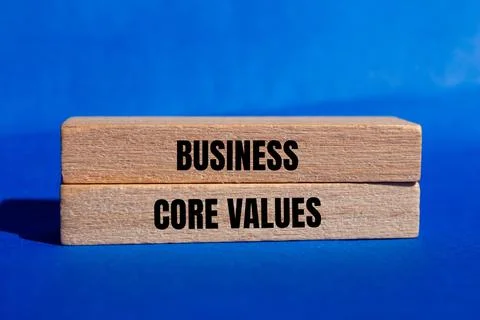 Business core values message written on wooden blocks with blue background. C Stockfoto's