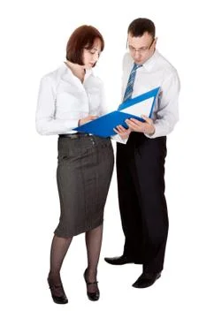 Business couple with a folder for documents in the studio Stock Photos