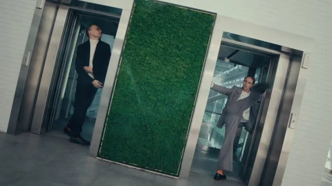 Business Couple Making Dancing Performance in Elevators Stock Footage 285838491