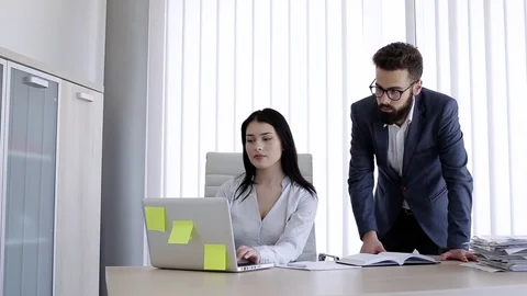 Business Couple In Office Stock Footage 76327652