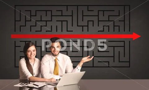 Business couple with a solved puzzle in background Stock Photos