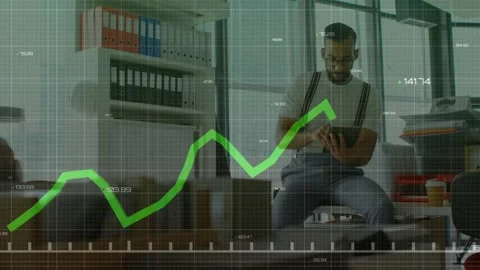 Business data analyst tapping tablet screen in office, generating green line Stock Footage 327280803