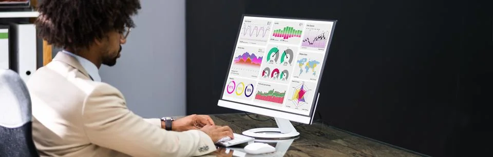 Business Data Analyst Using Computer Stock Photos