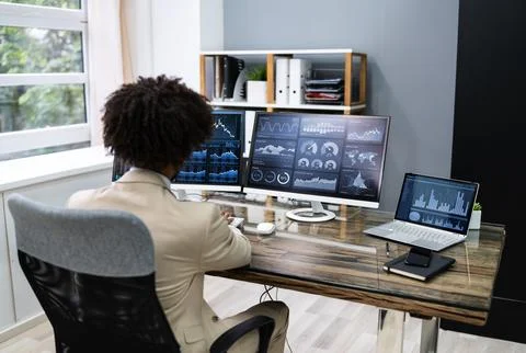 Business Data Analyst Using Computer Stock Photos