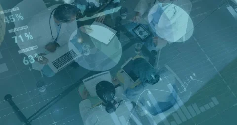 Business data and graphs animation over diverse professionals working in office Stock Footage 326877026