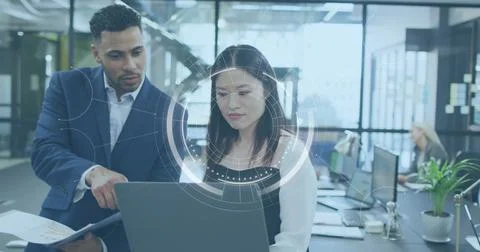 Business data processing image over diverse colleagues discussing work in modern 스톡 사진
