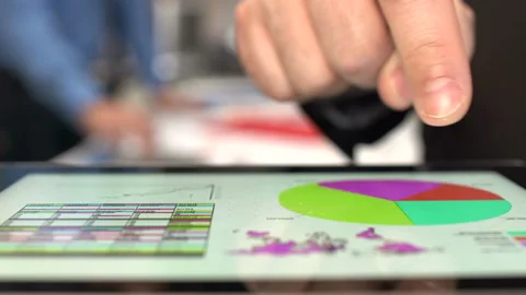 Business data on tablet  Stock-Footage 209909544