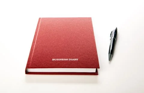 Business diary with pen Stock Photos