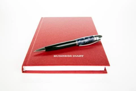 Business diary with pen Stock Photos