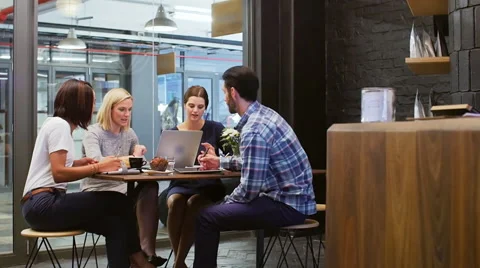Business discussion in cafe Stock Footage 58127944