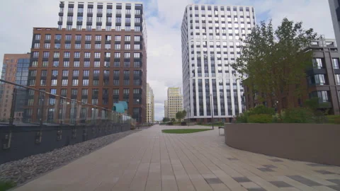 Business district includes pedestrian zone with trees FPV Видео 291321673