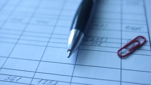 Business document income table handle close-up Stock Footage