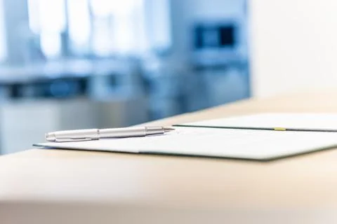 Business document in an open folder Stock Photos