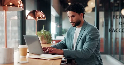 Business, documents and laptop with man in coffee shop for hybrid work, planning Stock Footage 335921118