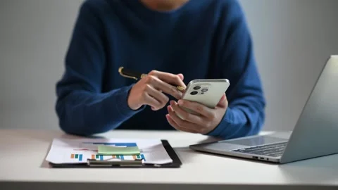 Business documents on office table with smart phone and digital tablet and .. Stock Footage 252183518