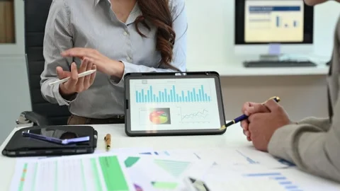 Business documents on office table with smart phone and calculator digital .. Video stock 313461396