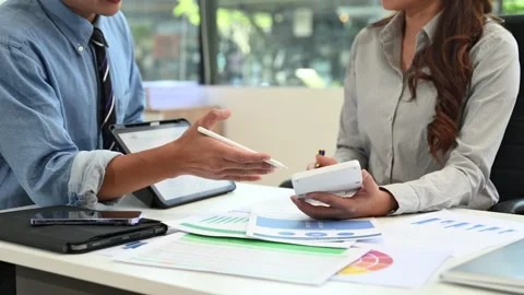Business documents on office table with smart phone and calculator digital .. Stock Footage 313461477