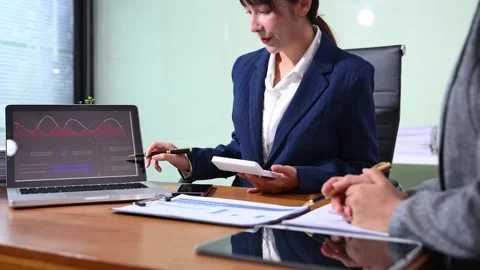 Business documents on office table with smart phone and calculator digital .. Video stock 314351253