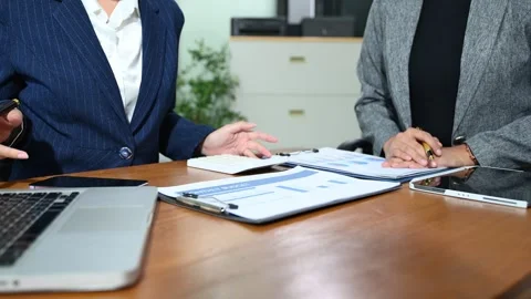 Business documents on office table with smart phone and calculator digital .. Video stock 314351285