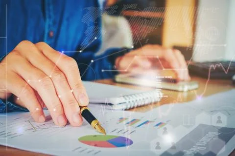 Business documents on office table with smart phone  graph financial with s.. Stock Photos
