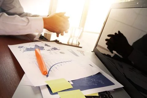 Business documents on office table with smart phone and digital tablet with.. Fotos Stock