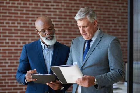 Business, documents or team in office with review, budget evaluation or feedback Stock Photos