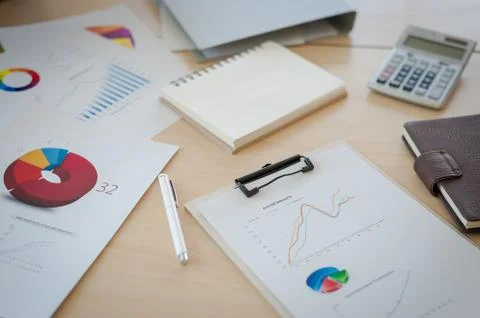 Business documents on table in office Stock Photos