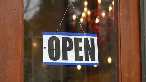 Business Door Closing with Open Sign Stock Footage