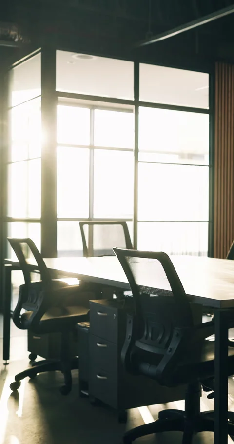 Business, empty and desk in office with flare, coworking furniture and window in Stock Footage 340816613