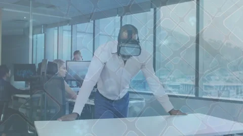 Business executive securing VR headset and exploring virtual interface for Stock Footage 311916001
