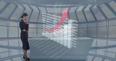 Business executive standing in control deck, with 3D bar chart and translucent Stock Photos
