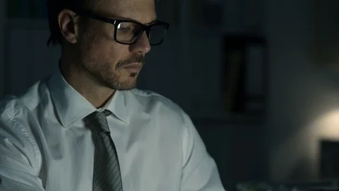 Business executive working late at night Stock Footage 89200413