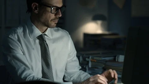 Business executive working late at night Stock Footage 89200568