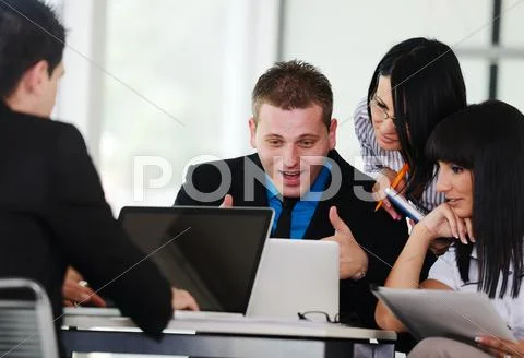 Business executives at a meeting discussing a work Stock Photos